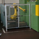 Isola robotizzata di asservimento macchine con carico da barra